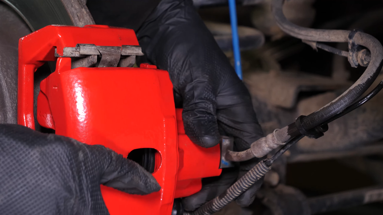Remove the rear brake system