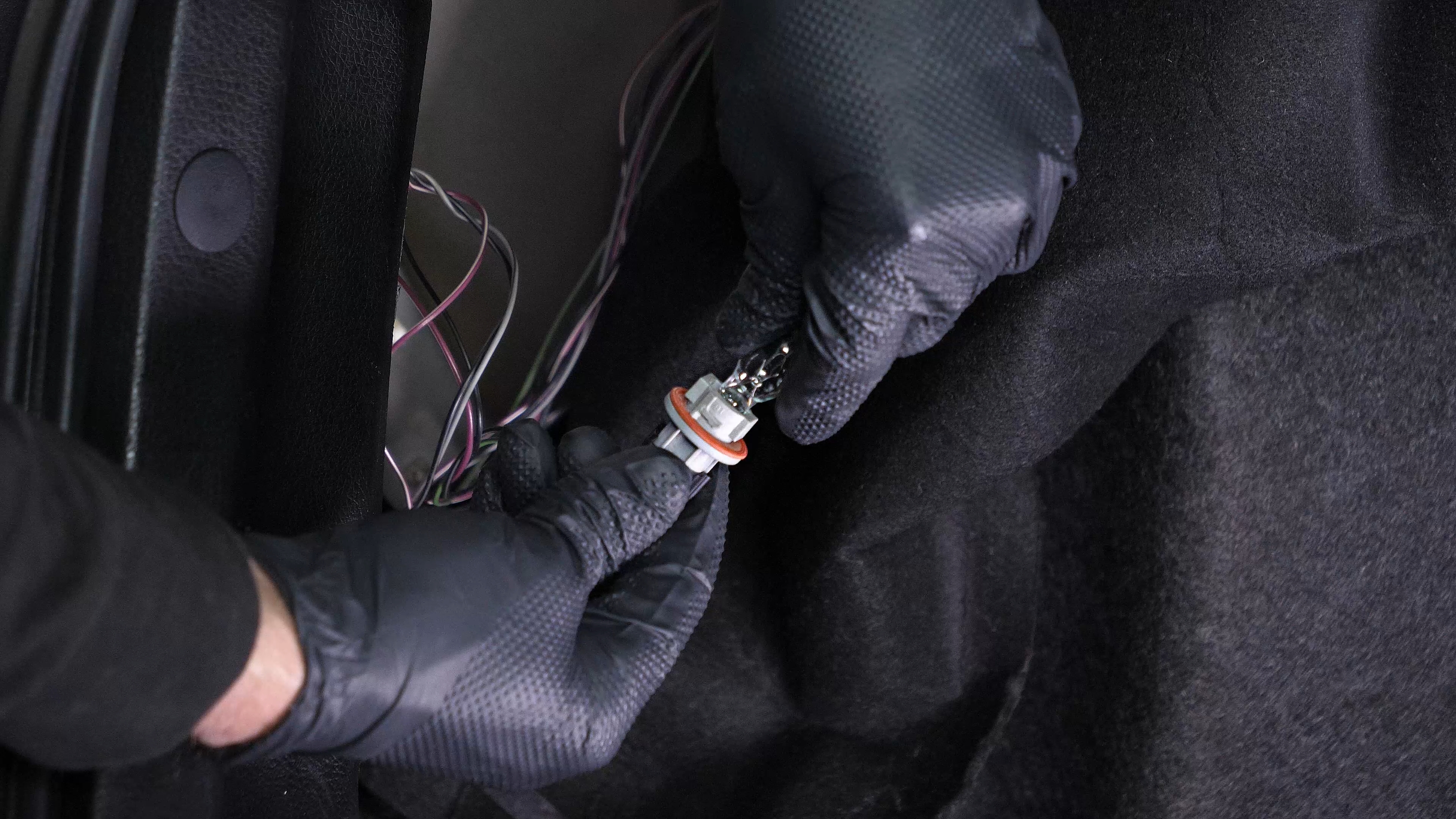 Replace the reverse light bulb