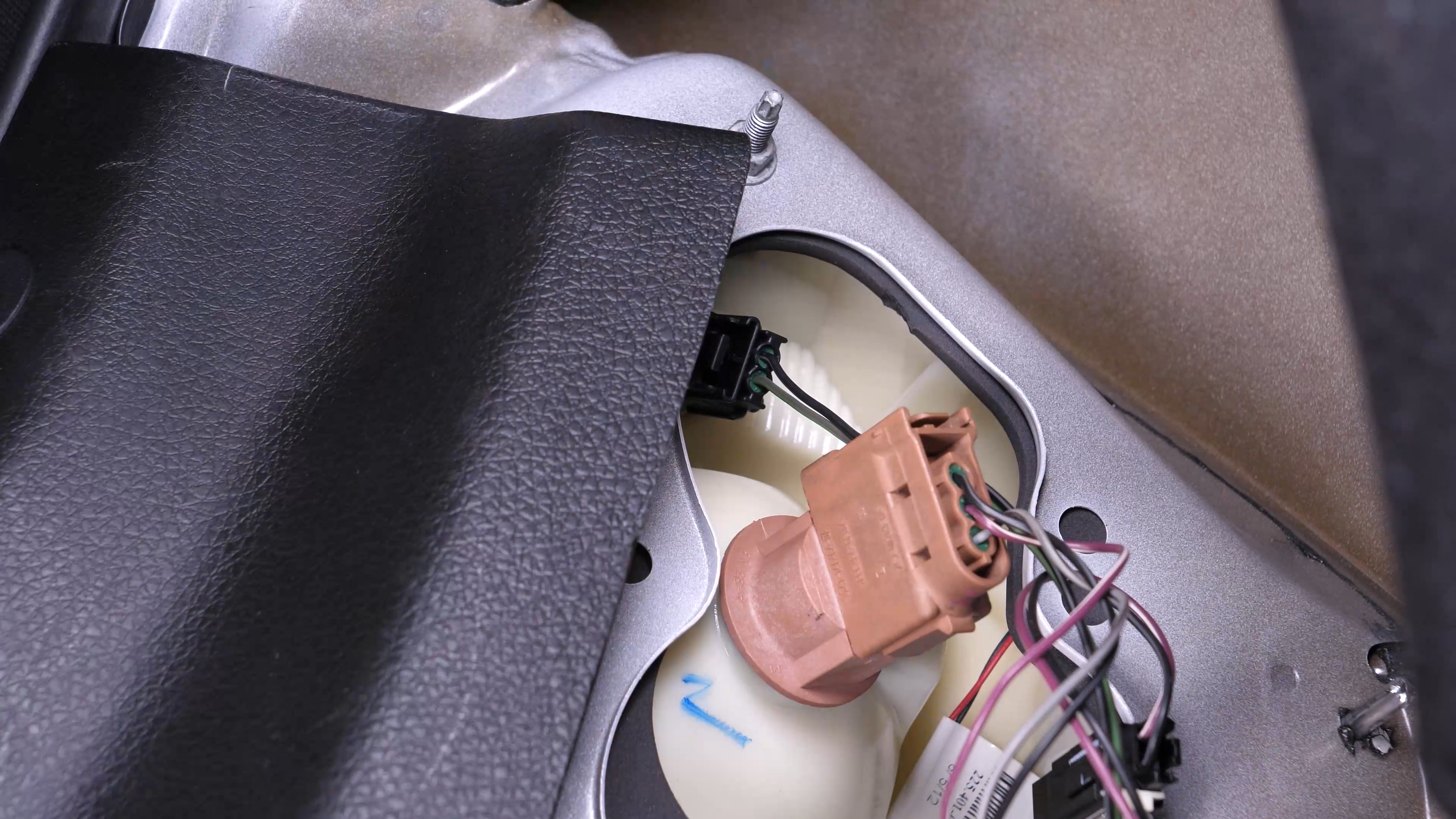 Replace the reverse light bulb