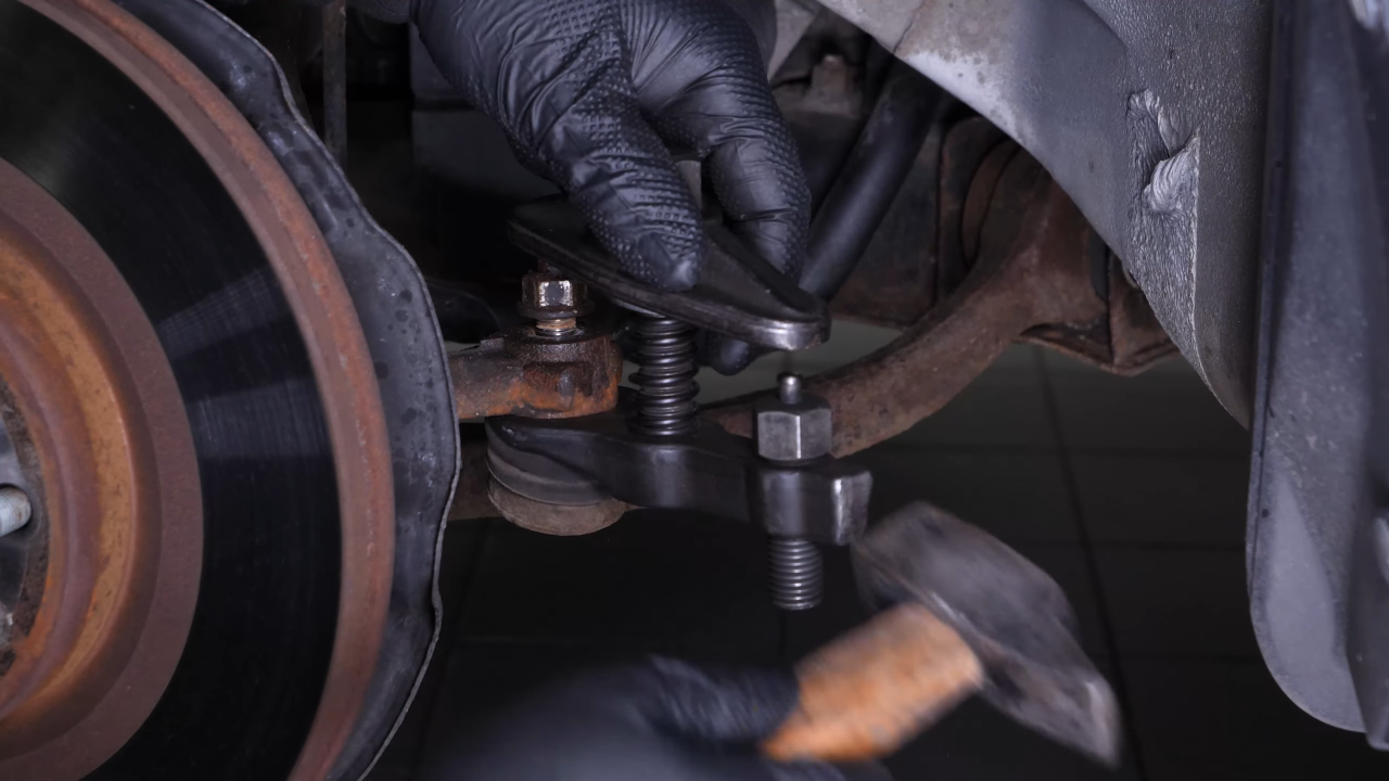 Remove the outer tie rod