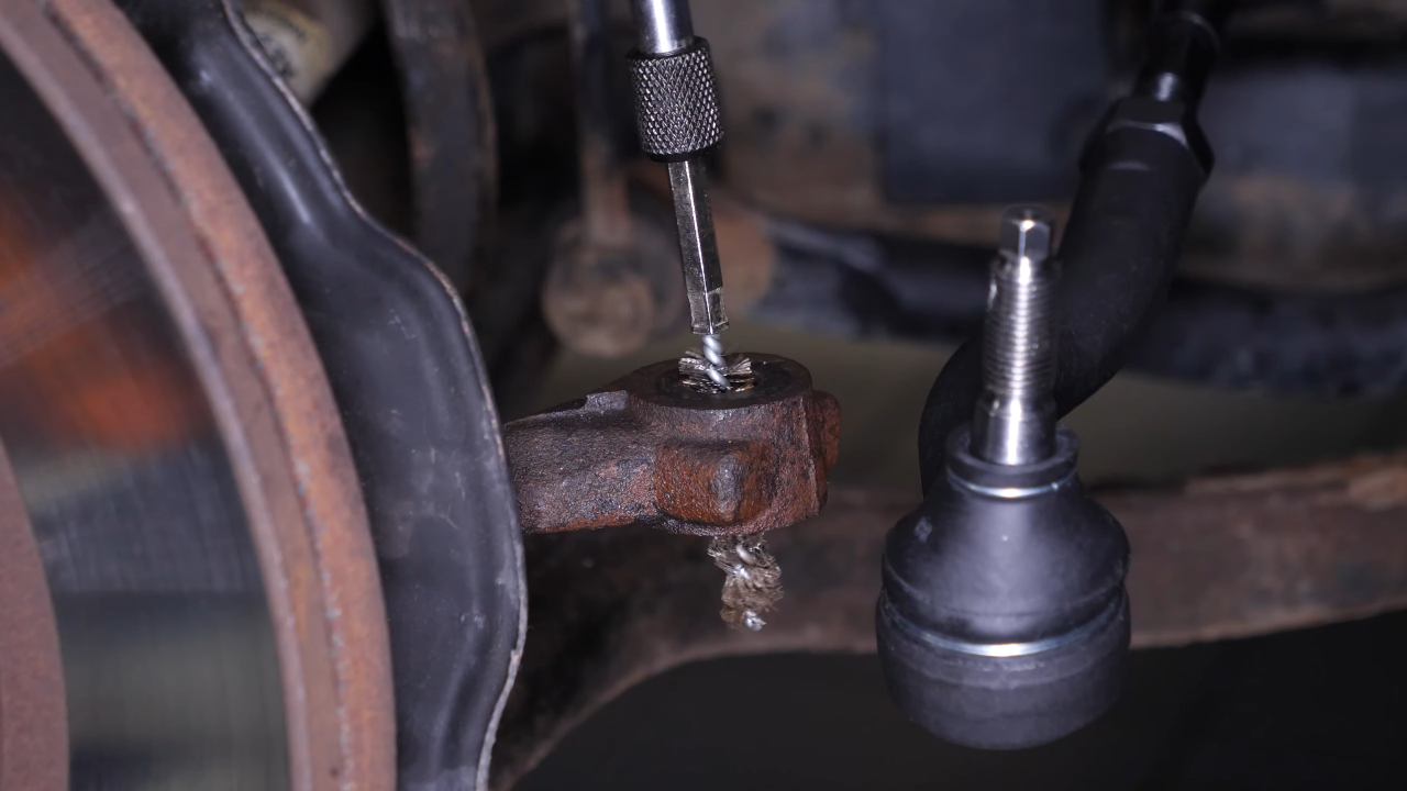 Install the new outer tie rod