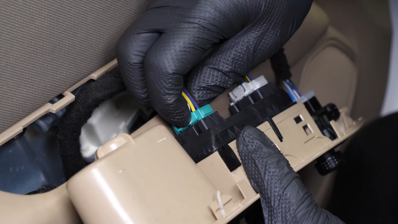 Disconnect the power window controls