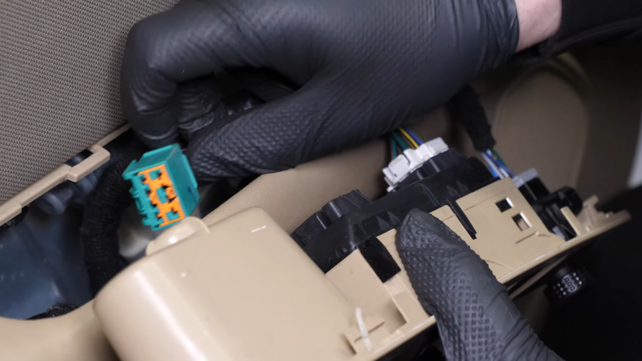 Disconnect the power window controls