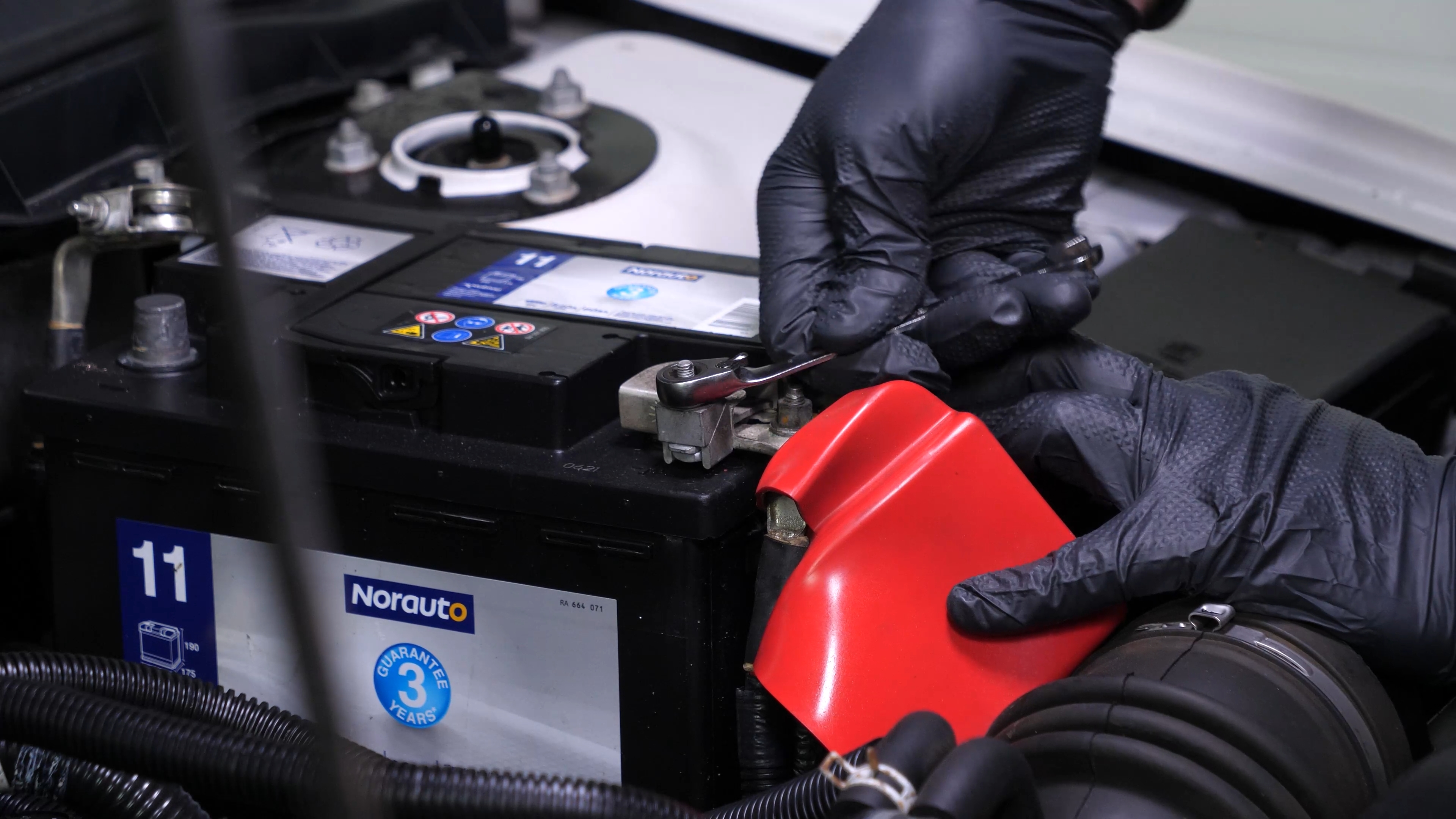 Remove the positive terminal