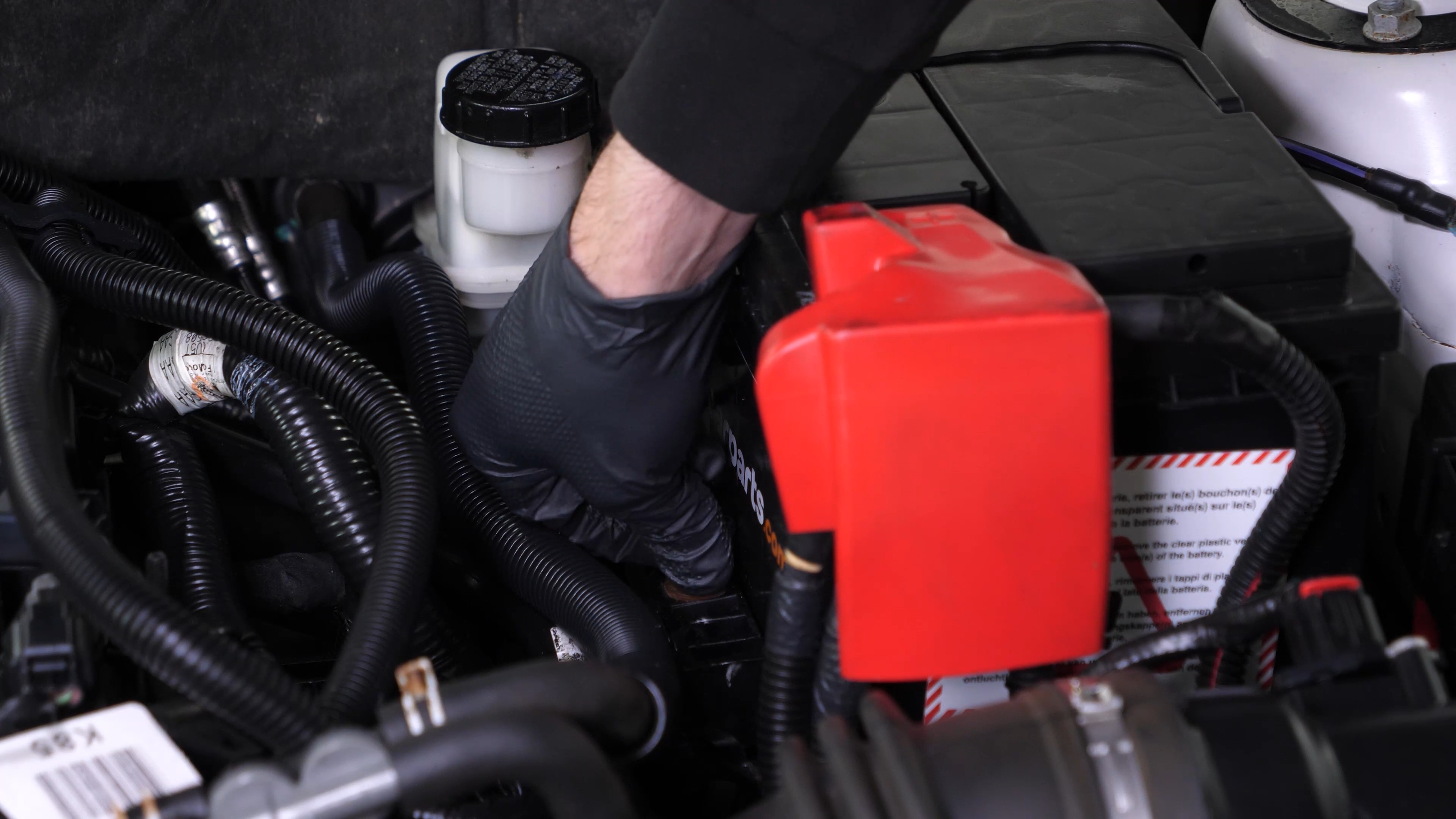 Put the battery clamp back