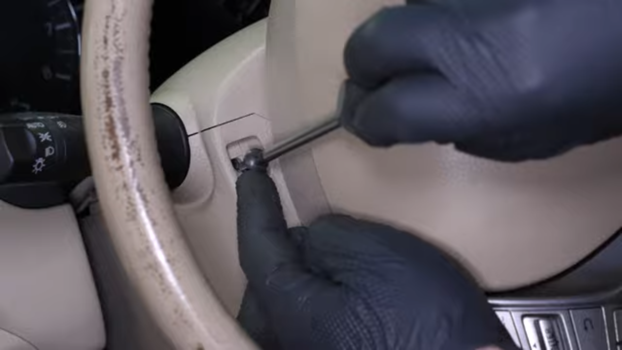 Remove the steering column cover