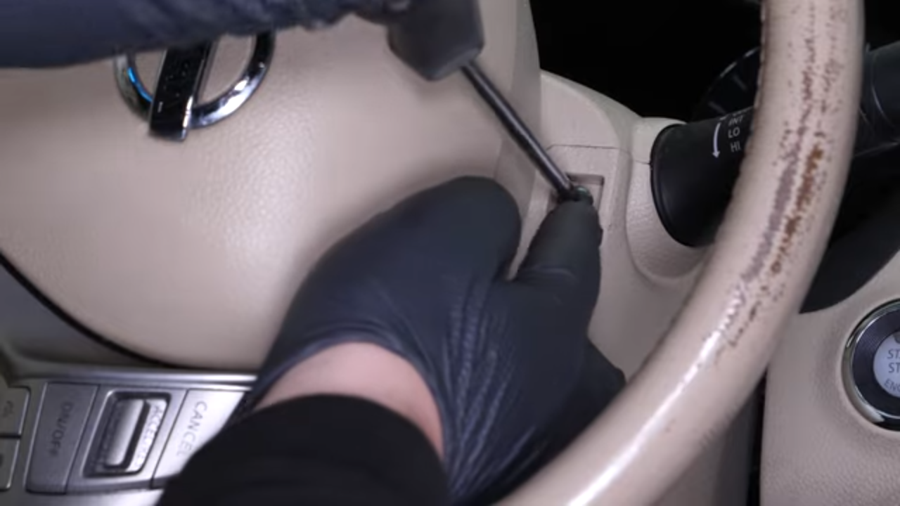 Remove the steering column cover