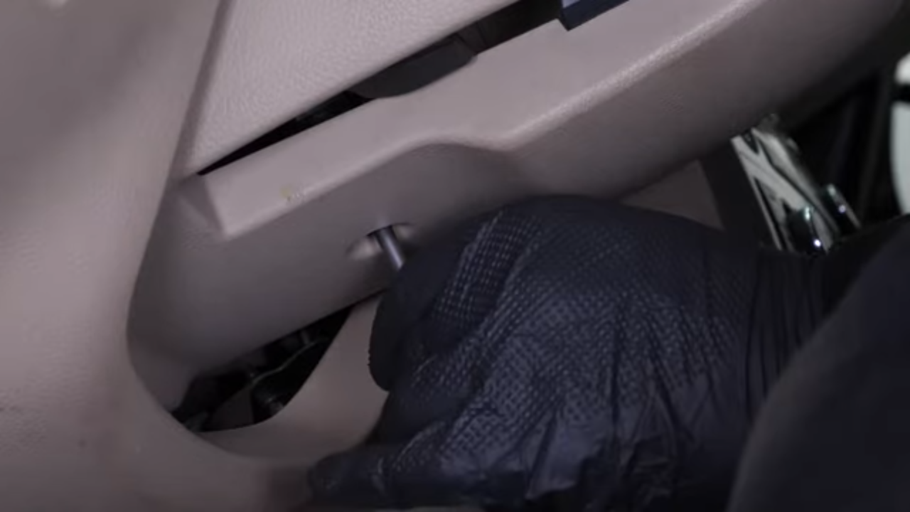 Remove the steering column cover