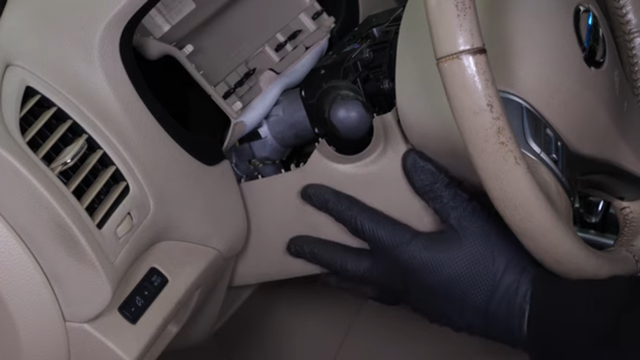 Remove the steering column cover