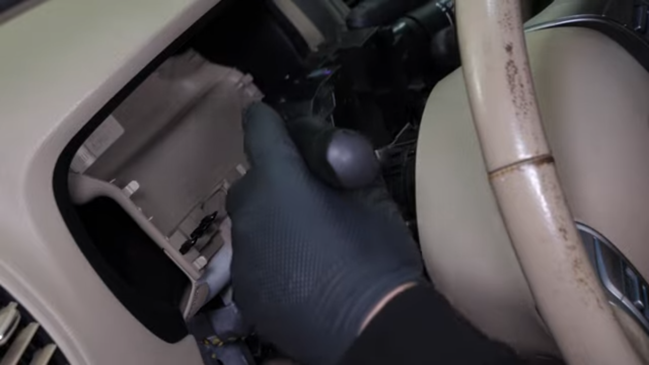 Put the turn signal switch back