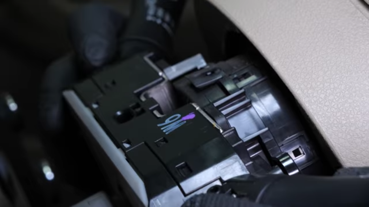 Put the turn signal switch back