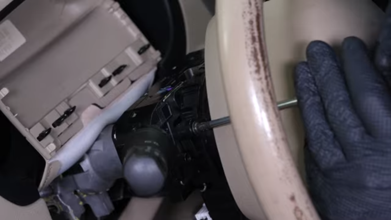 Put the turn signal switch back
