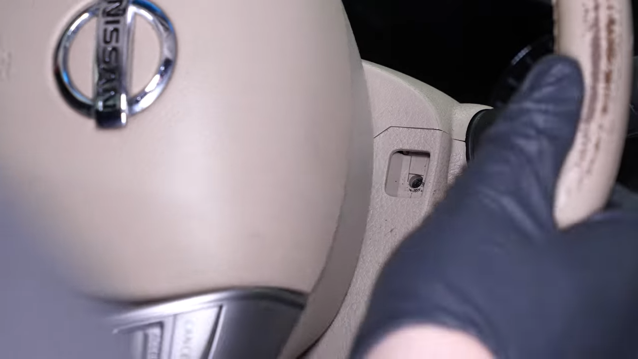 Put the steering column cover back