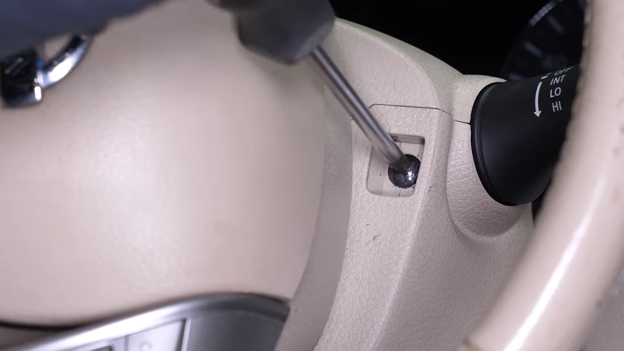 Put the steering column cover back