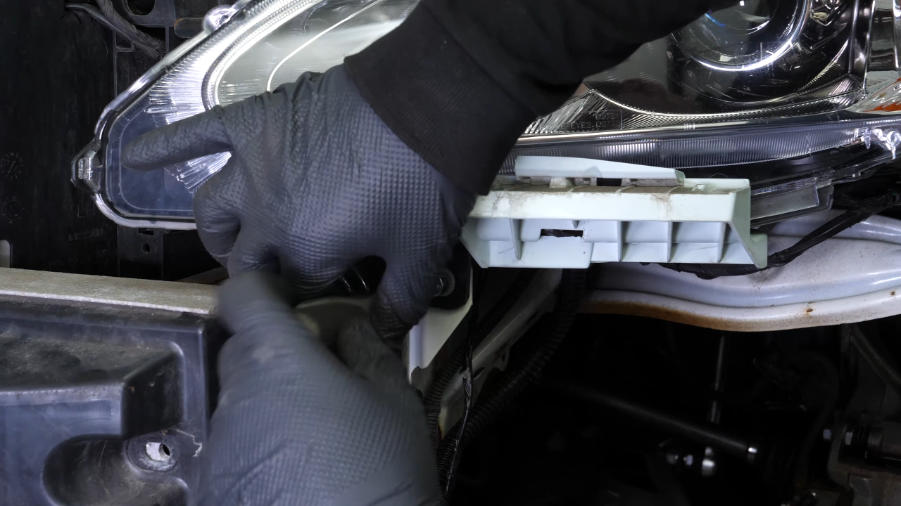 Remove the headlight housing