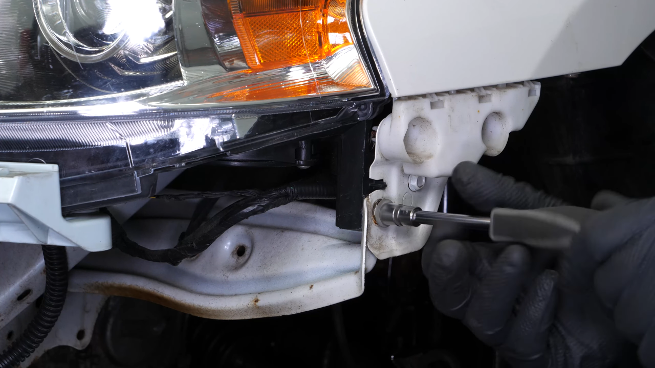 Remove the headlight housing