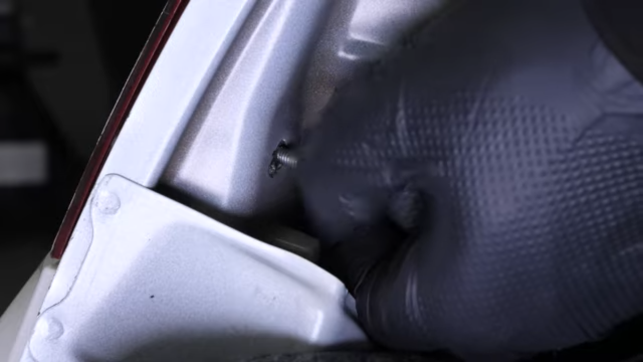 Remove the tail light housing