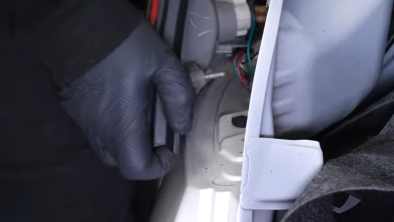 Remove the tail light housing