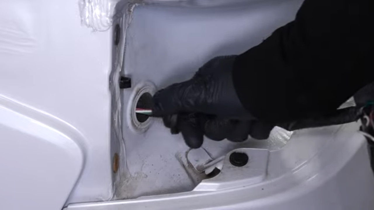 Remove the tail light housing