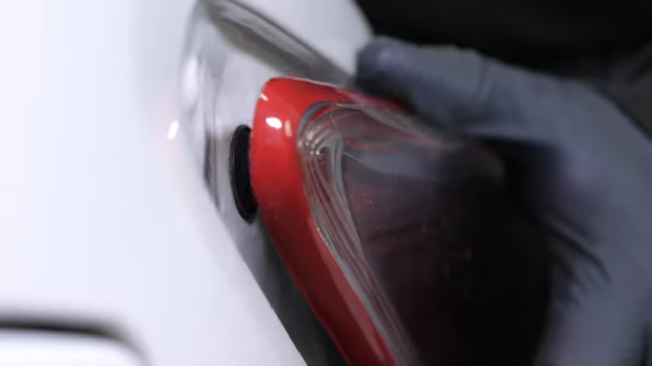 Put the tail light housing back