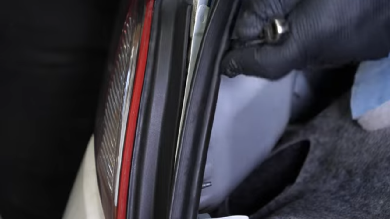 Put the tail light housing back