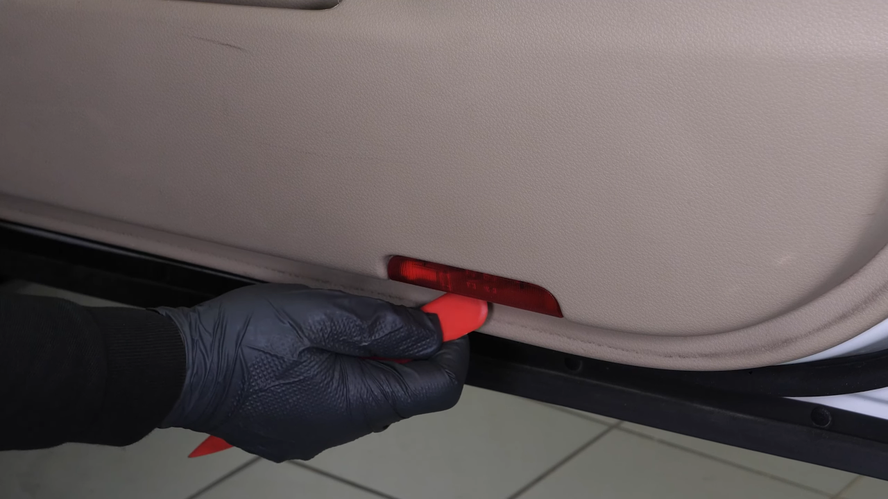 Disconnect the sidelight connector