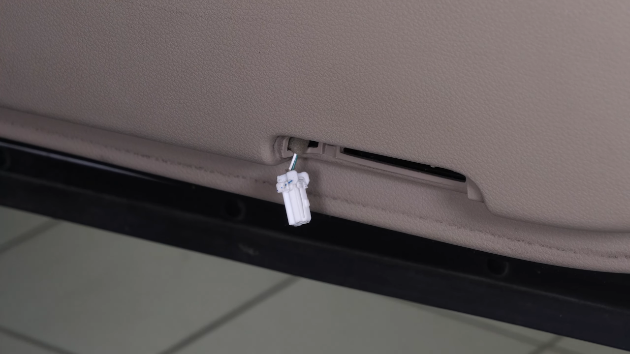 Disconnect the sidelight connector