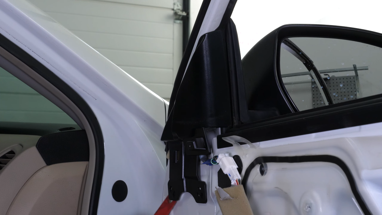 Remove the side view mirror