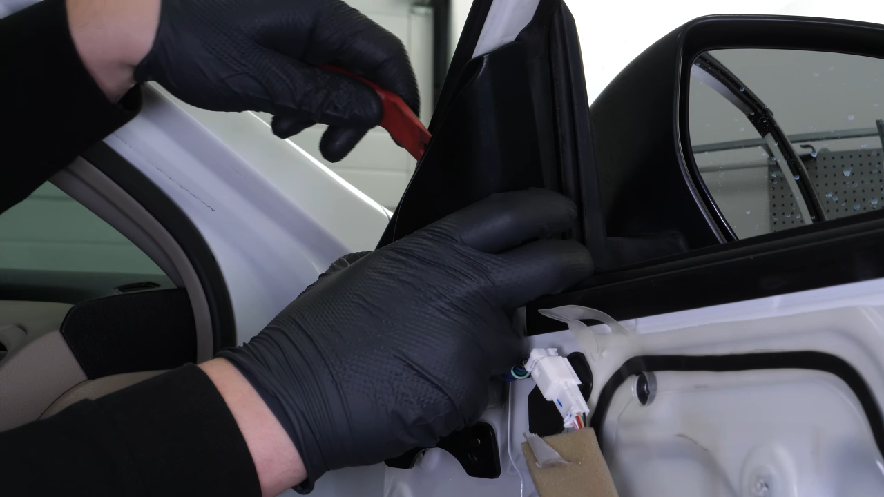 Remove the side view mirror