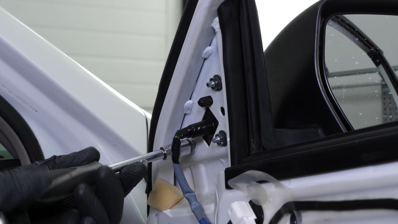 Remove the side view mirror
