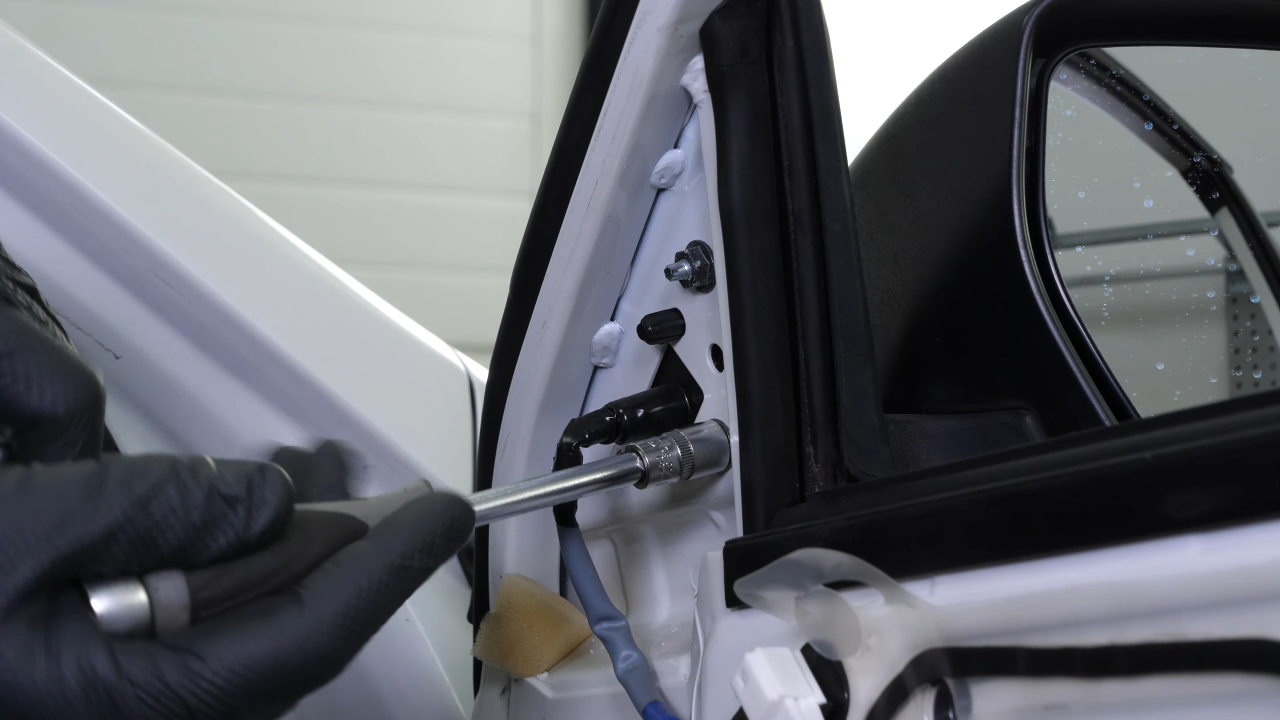Remove the side view mirror