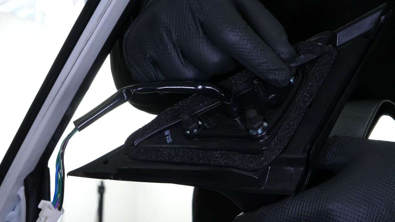 Install the new side view mirror