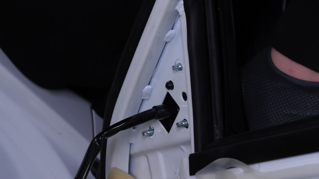 Install the new side view mirror