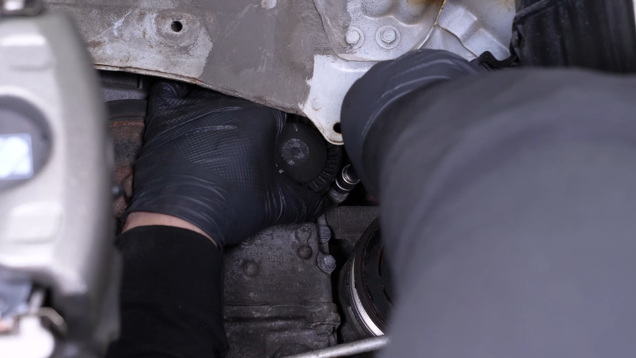 Remove the tensioner pulley