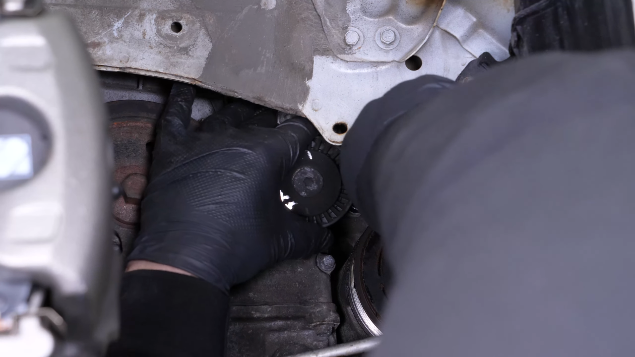 Remove the tensioner pulley