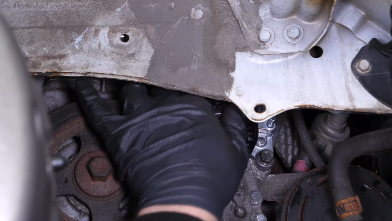 Install the new tensioner pulley