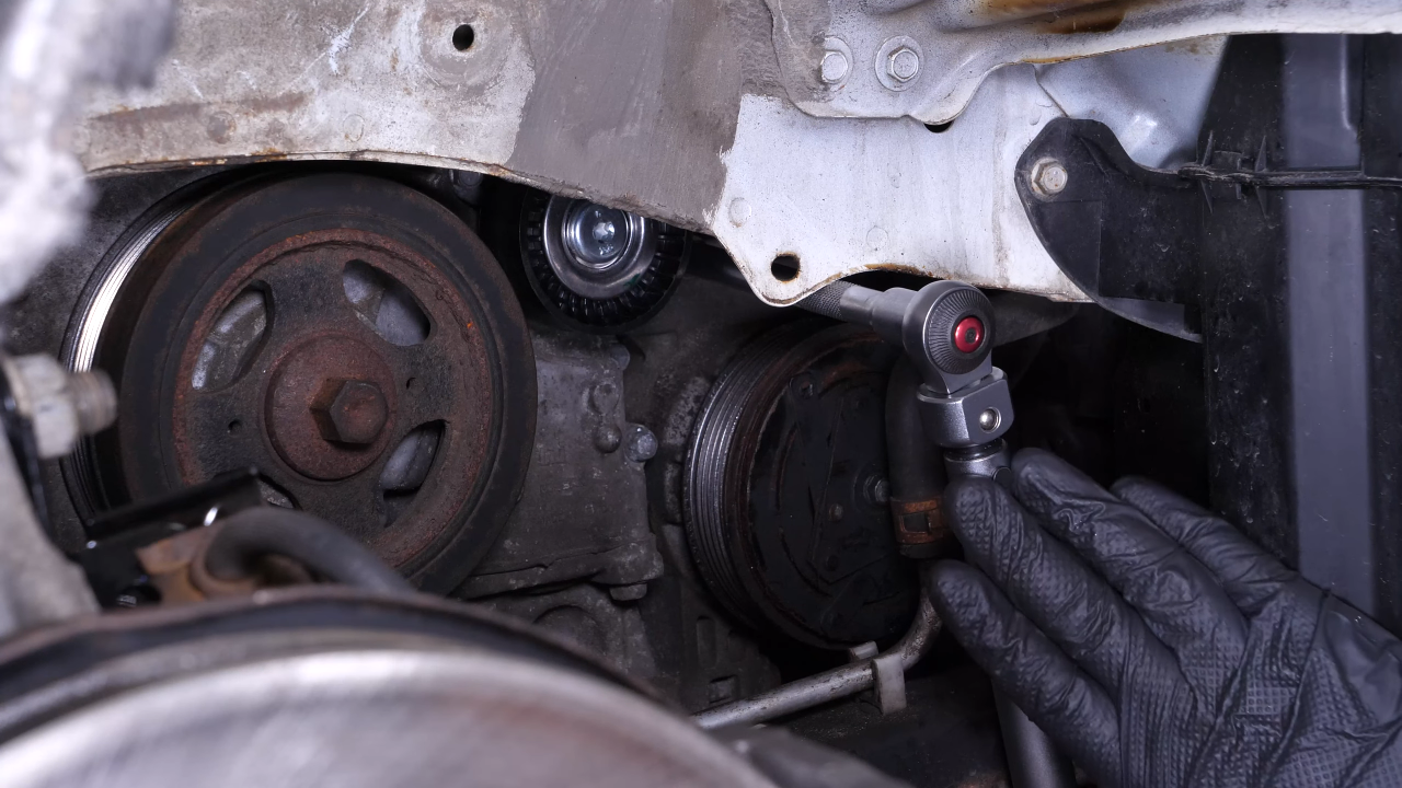 Install the new tensioner pulley