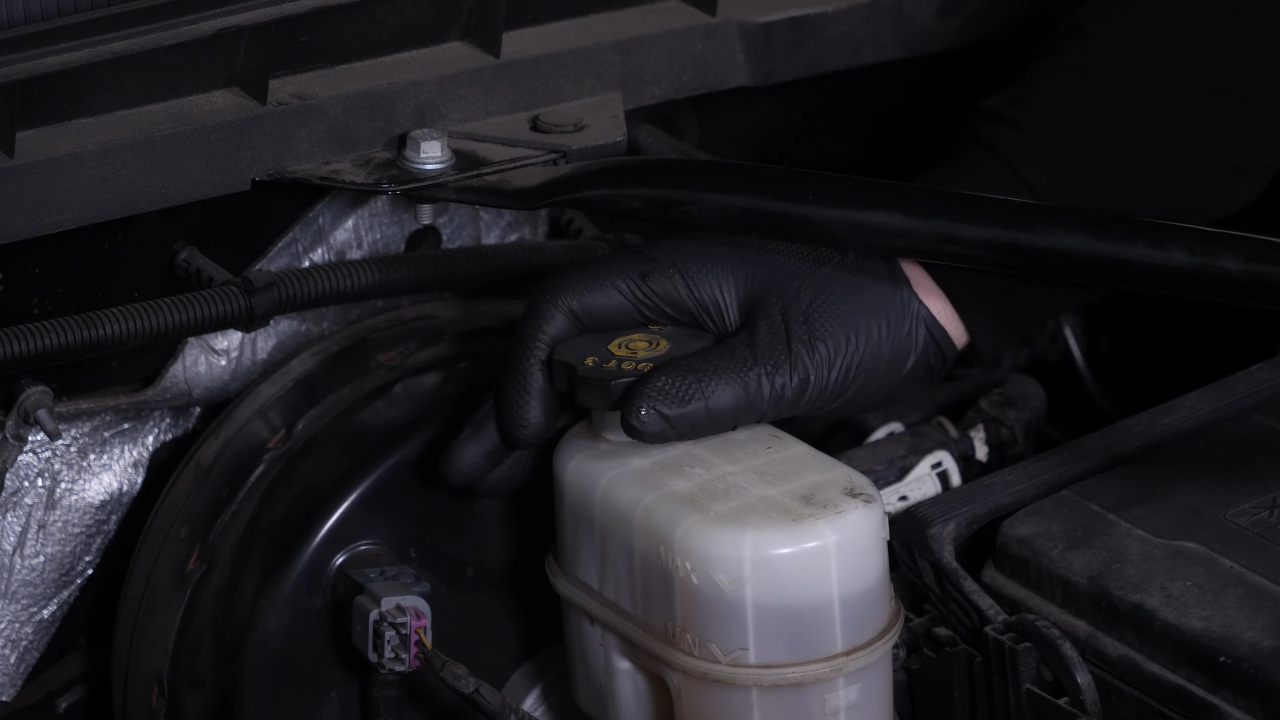 Open the brake fluid reservoir