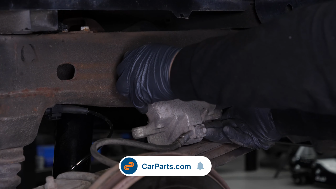 Remove the  brake caliper