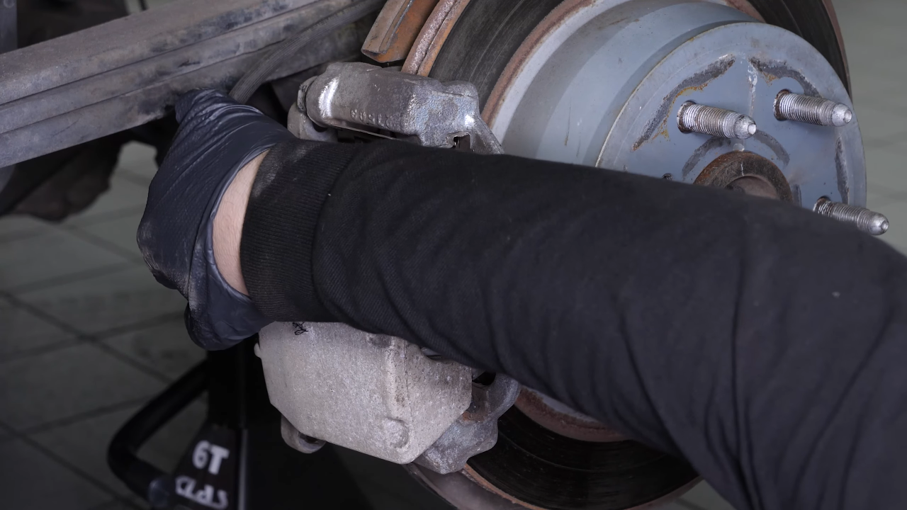 Remove the brake caliper