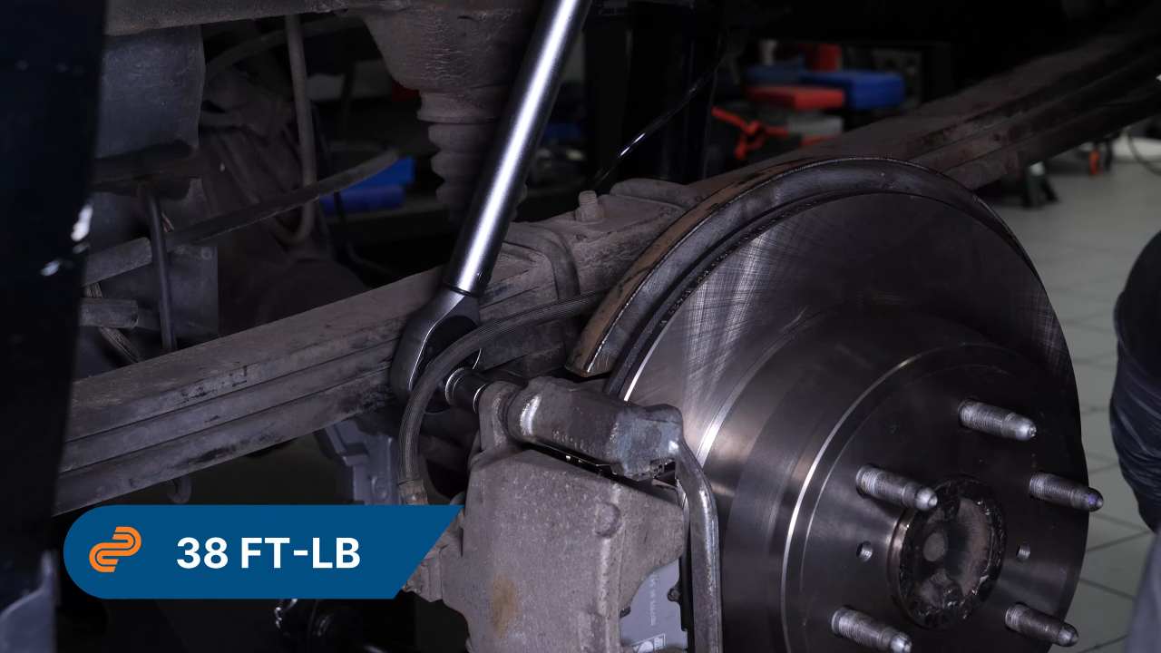 Put the brake caliper back