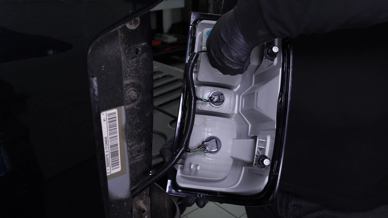 Replace the tail light bulbs