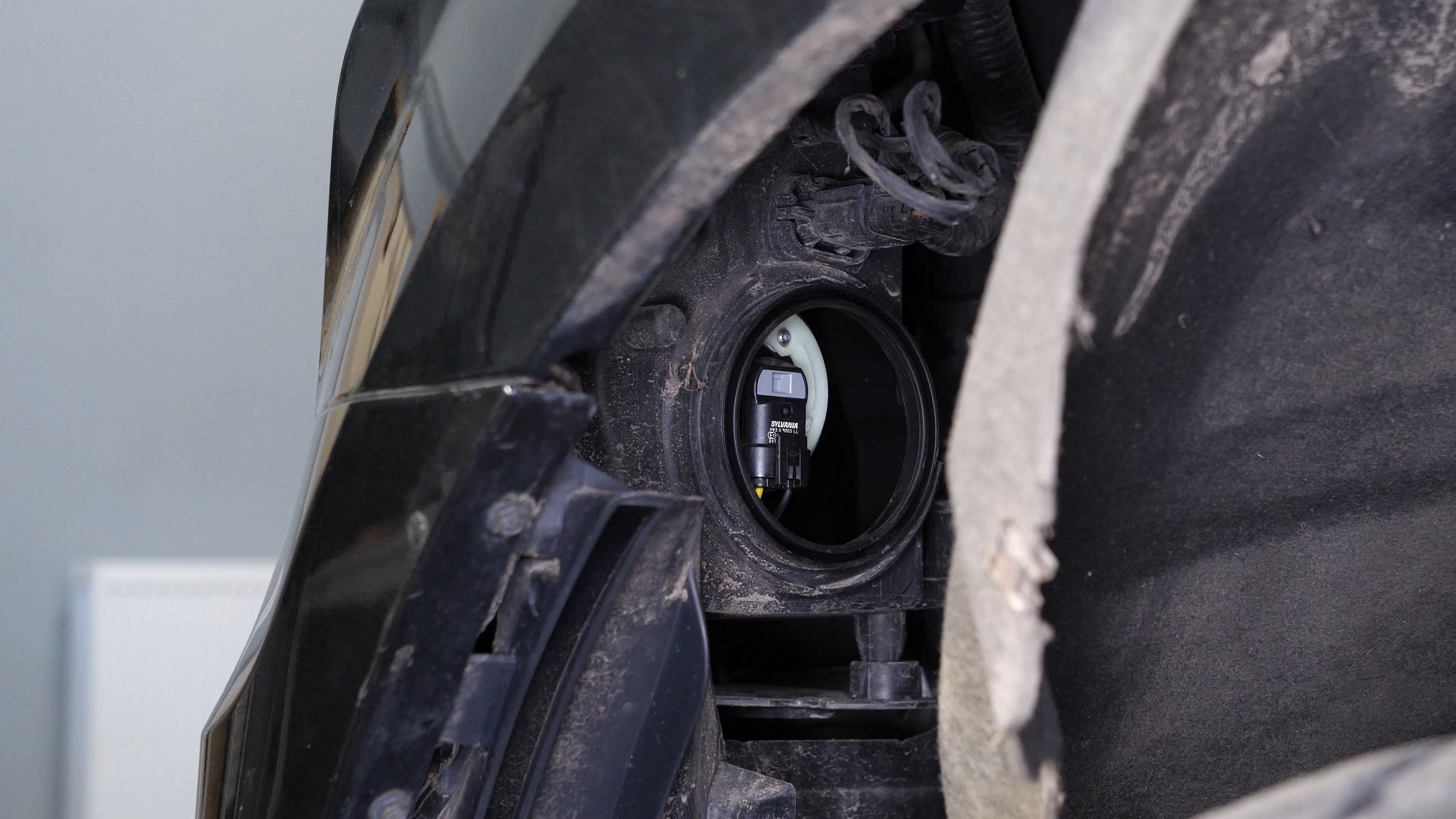 Replace the high beam bulb