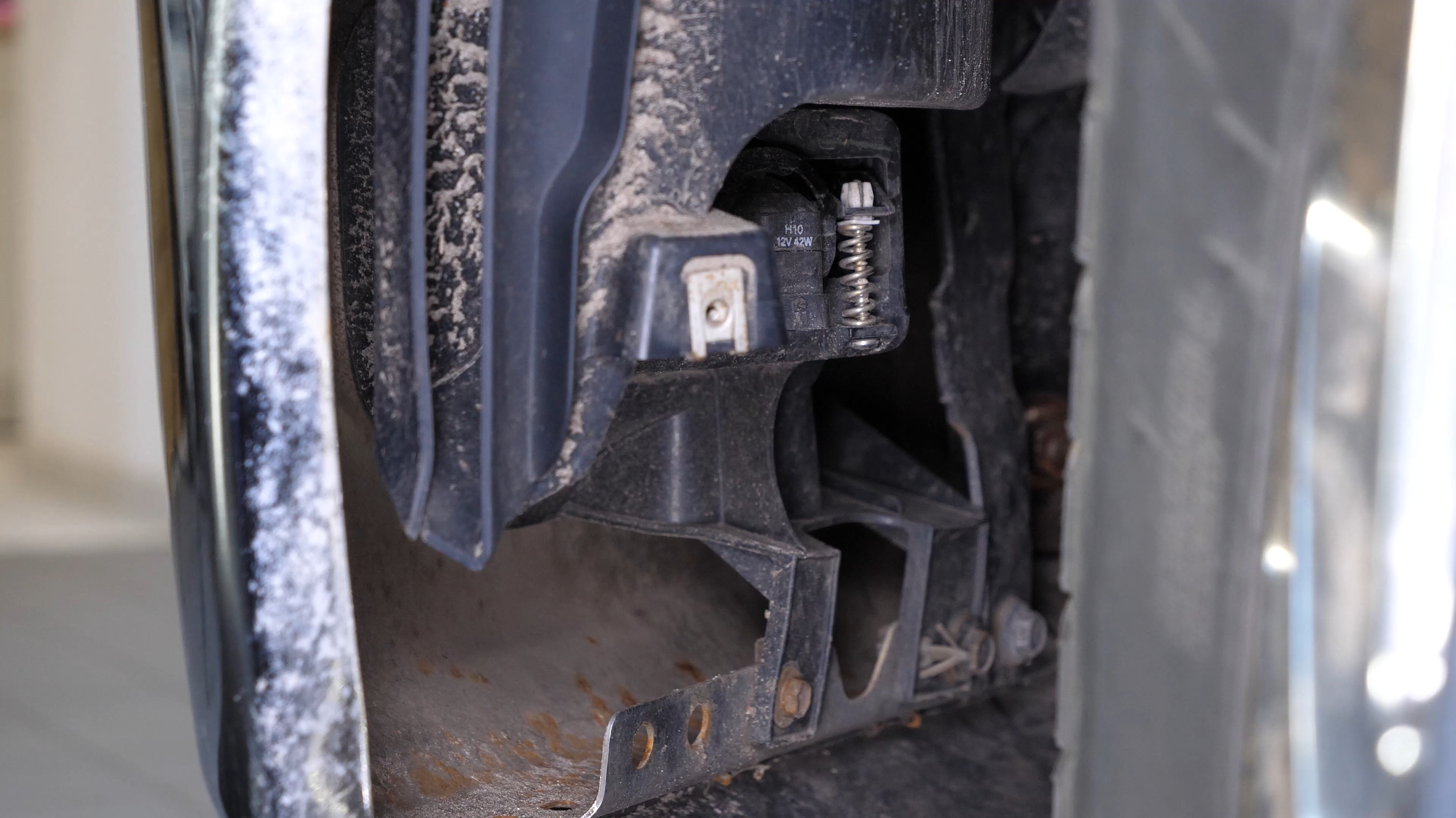 Replace fog light bulb
