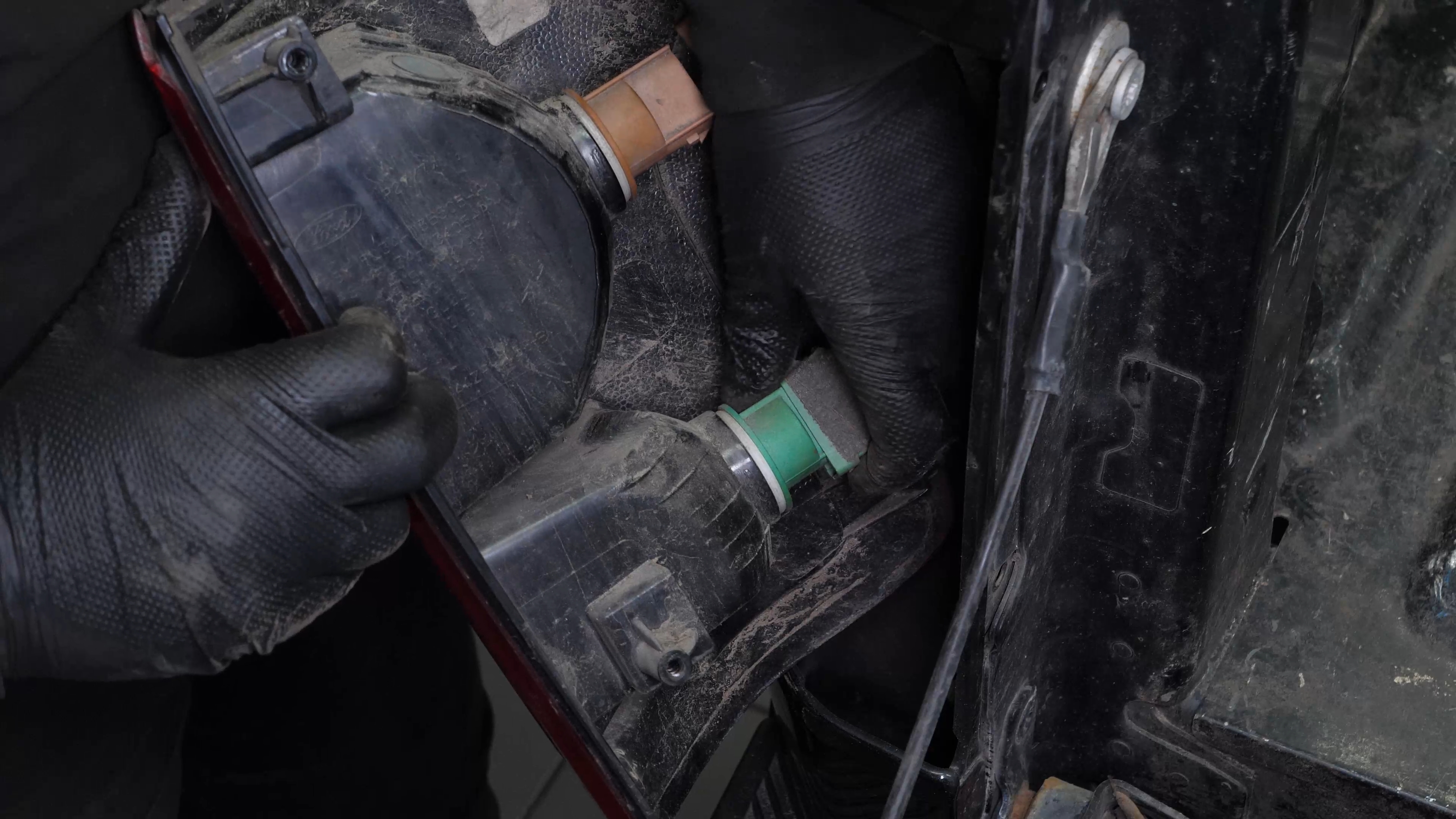 Replace the tail light bulbs