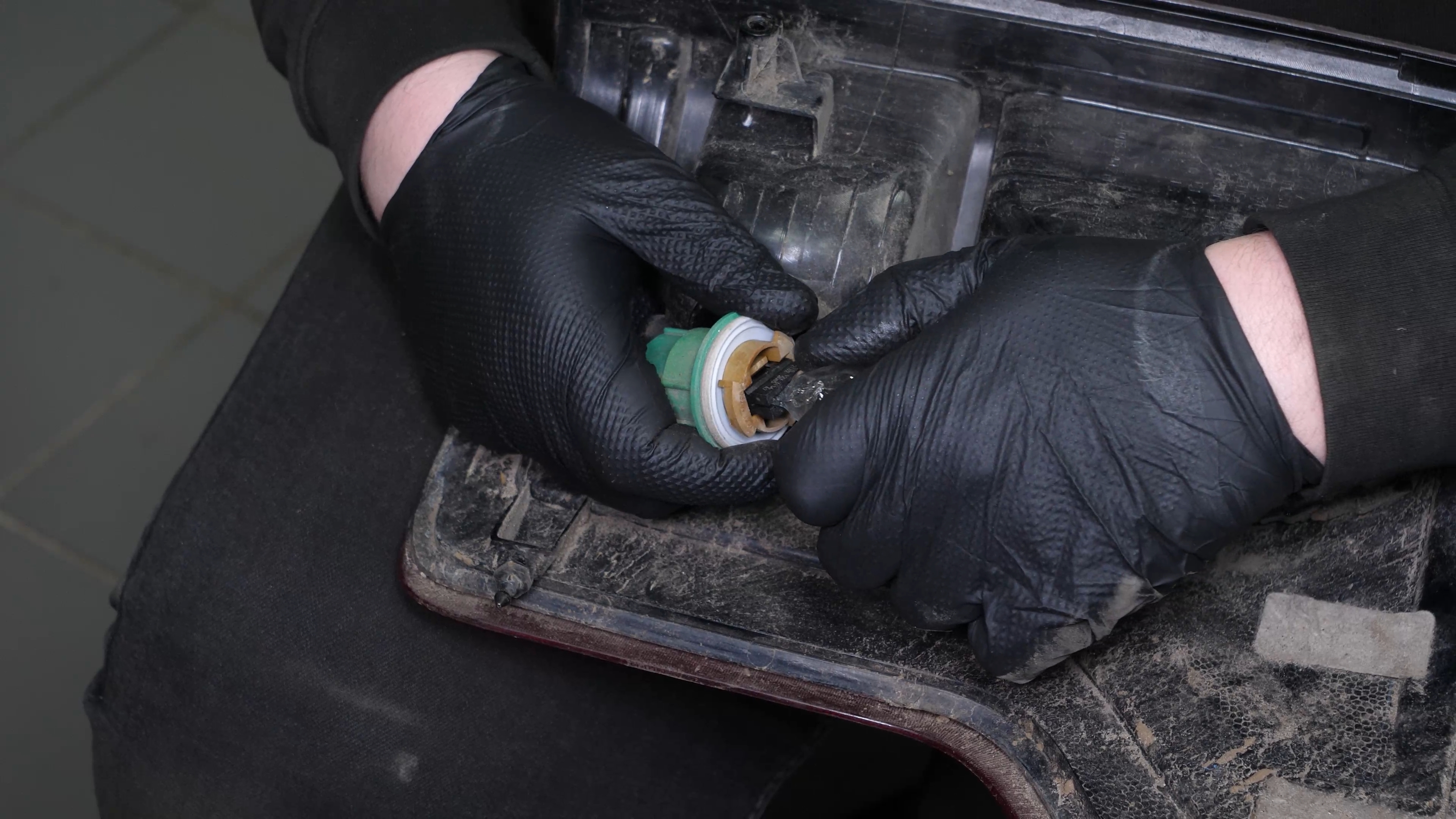 Replace the reverse light bulb