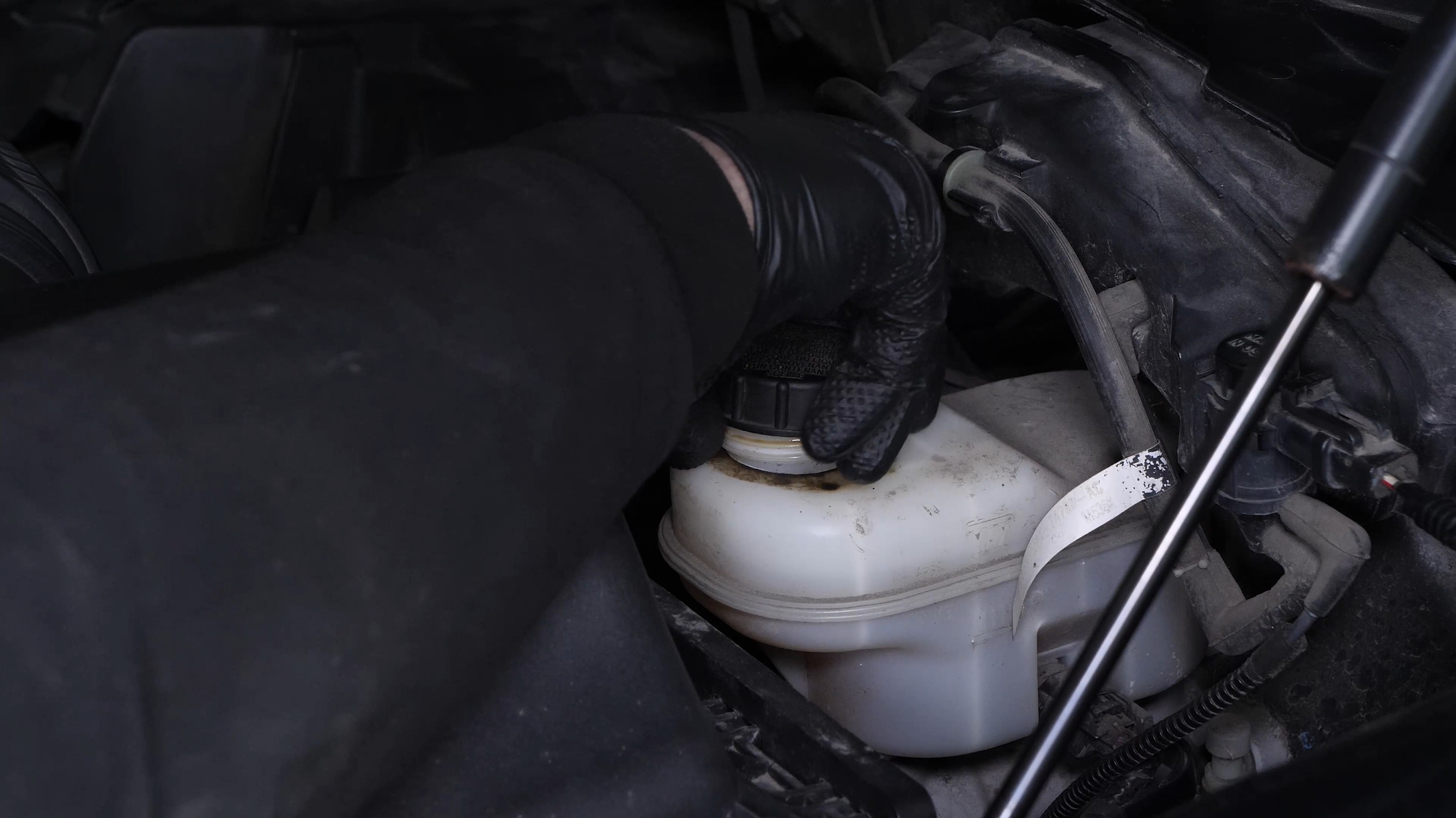 Open the brake fluid reservoir