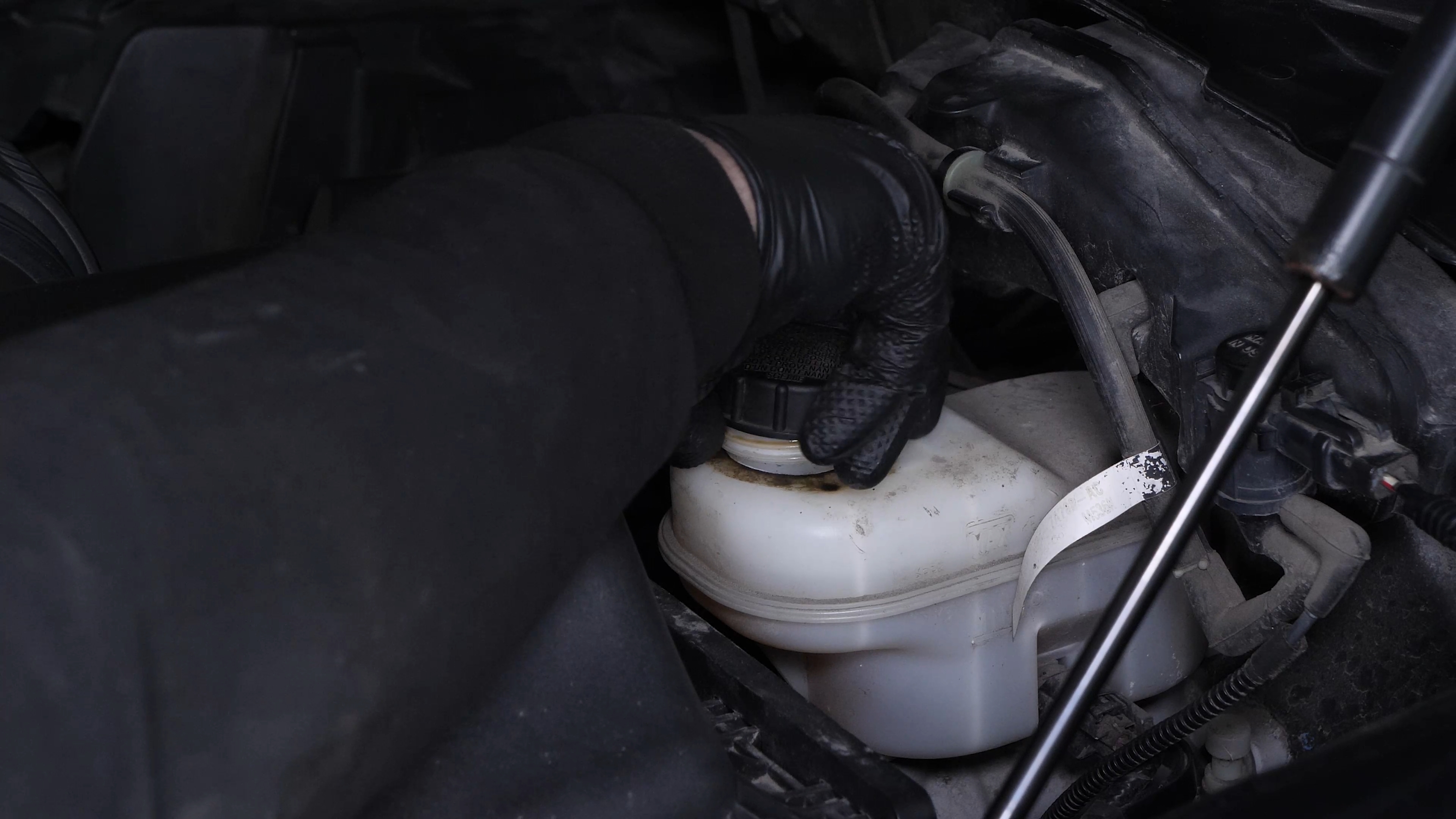 Open the brake fluid reservoir