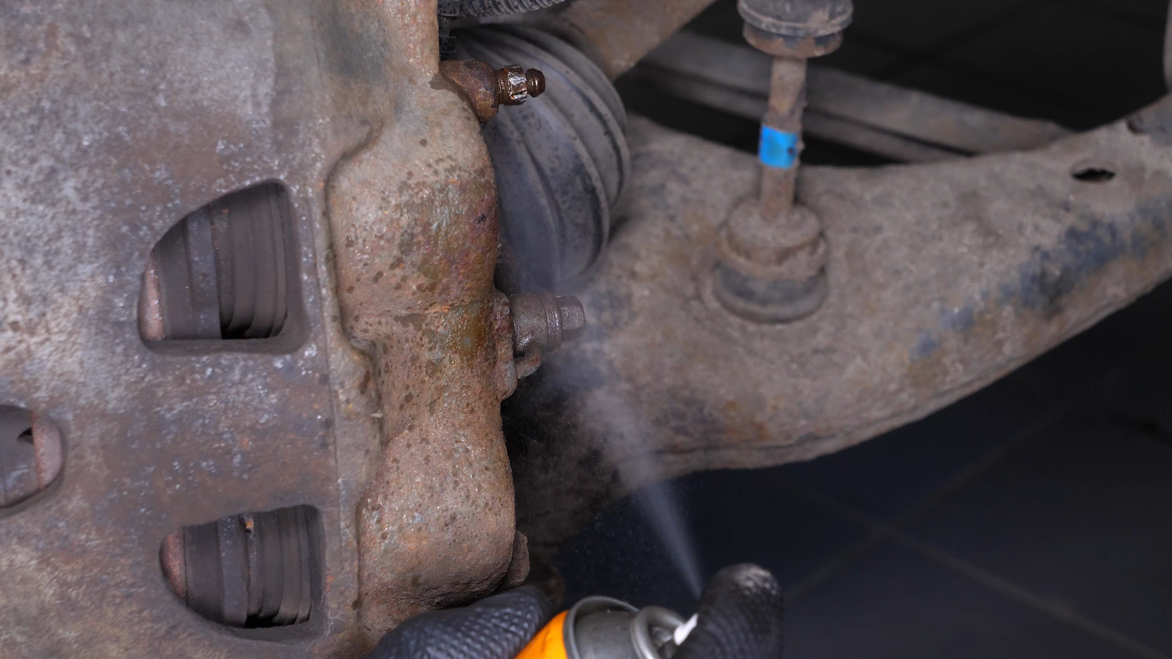 Unscrew the brake hose from the brake caliper