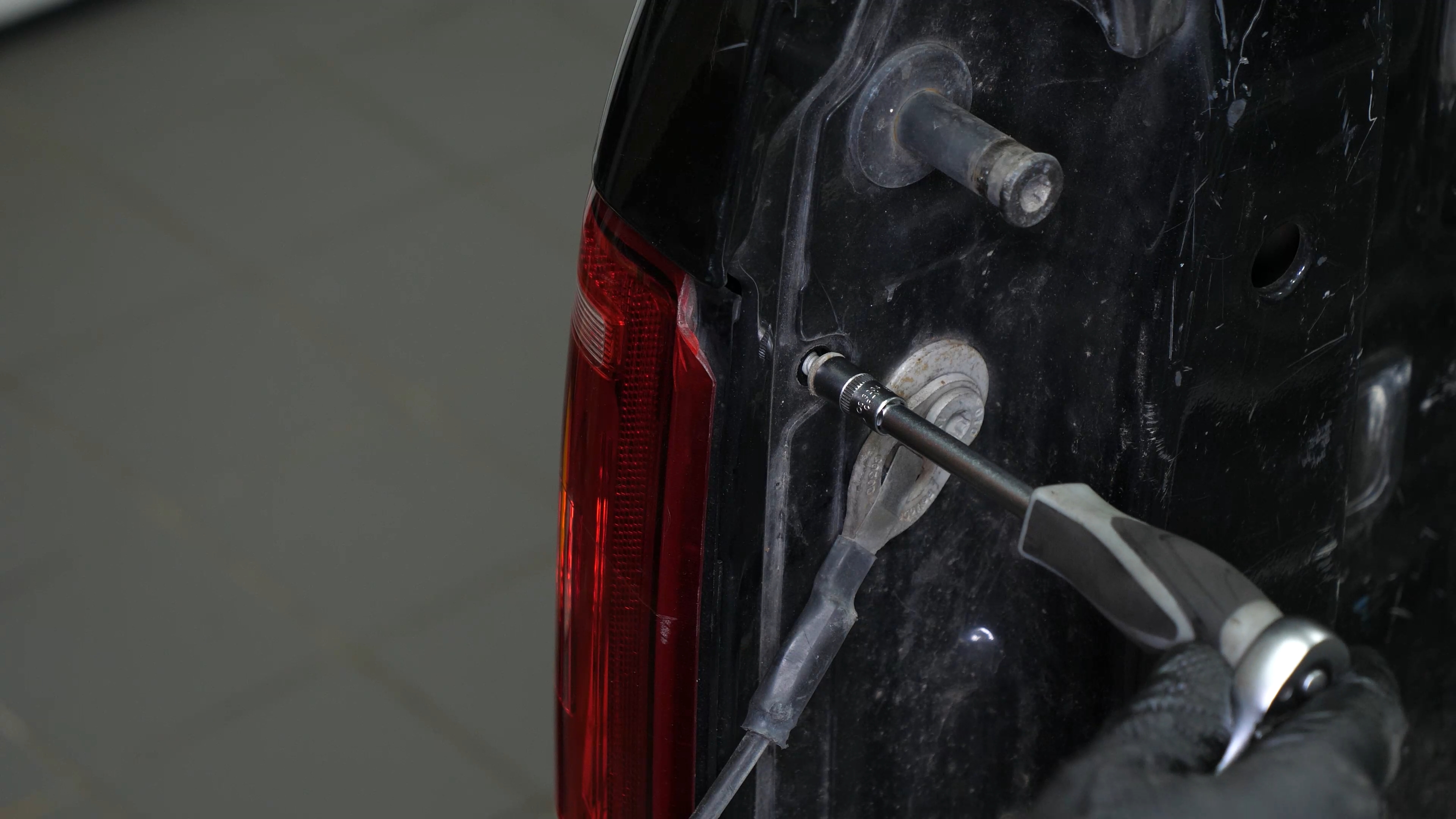Remove the tail light housing